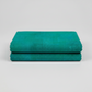 Interwoven Emerald quilting cotton showing fabric texture and geometric pattern detail