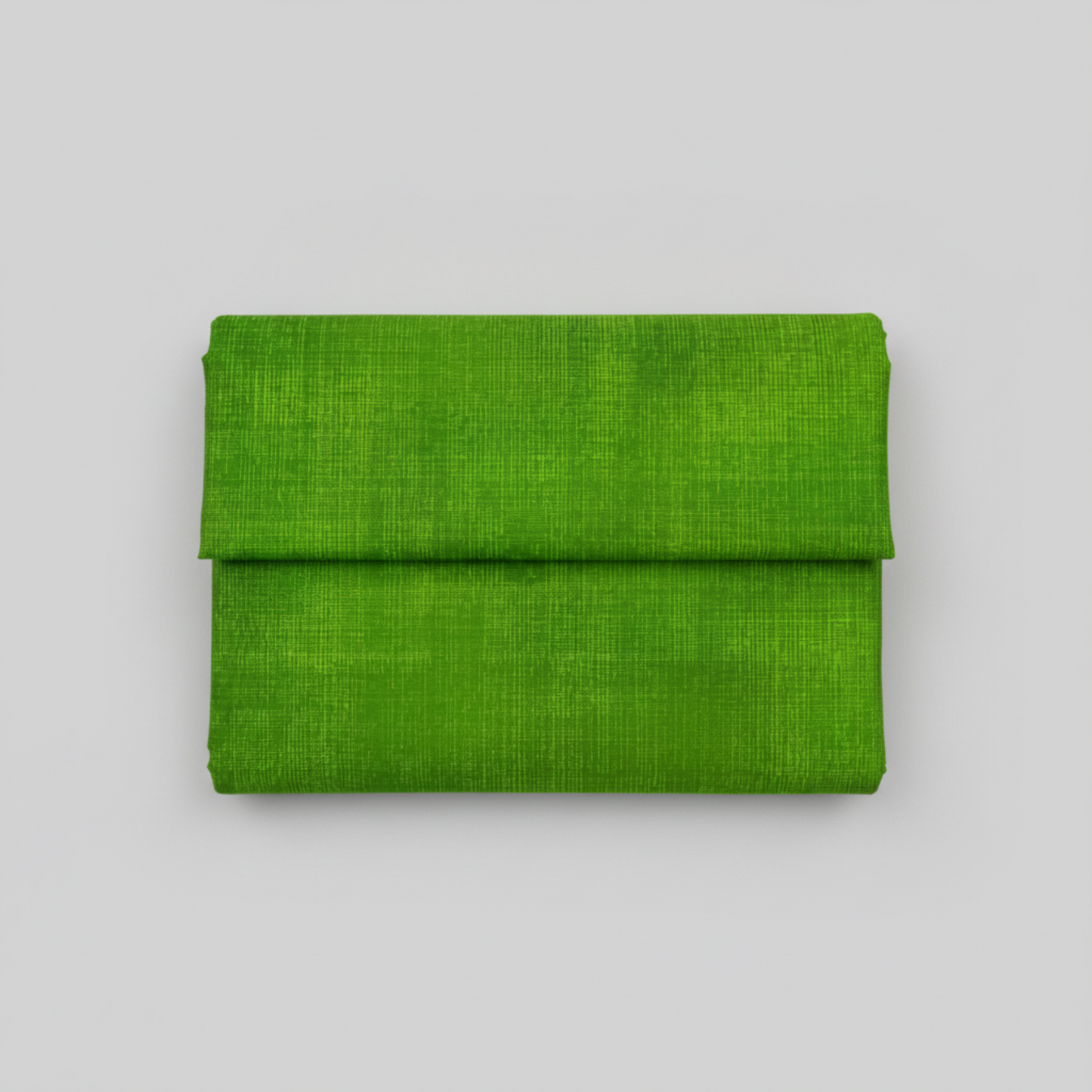 Interwoven Green quilting cotton showing fabric texture and geometric pattern detail