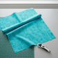 Interwoven Turquoise quilting cotton fabric by Jason Yenter showing vibrant turquoise blue-green geometric woven pattern