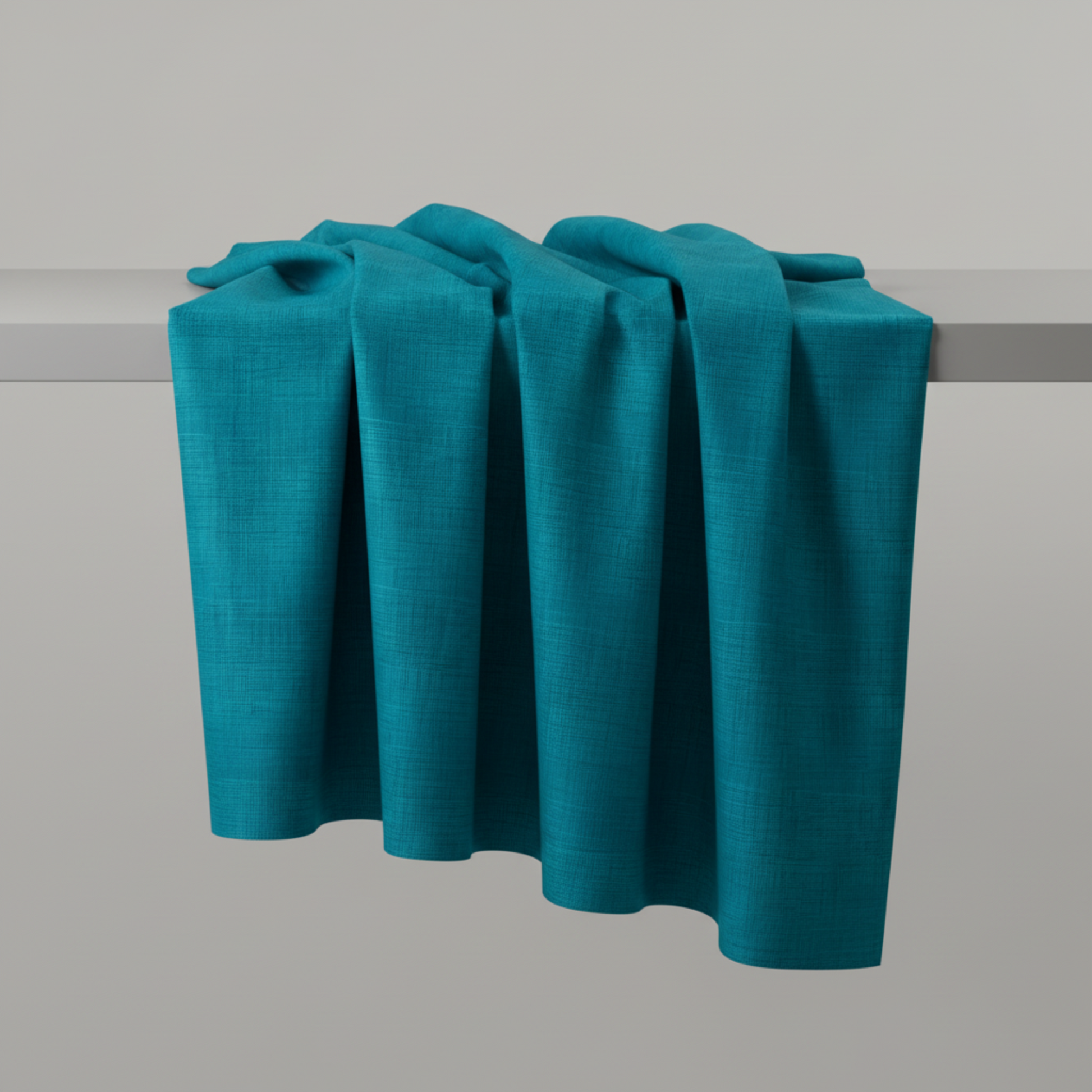 Interwoven Teal quilting cotton showing fabric body and drape quality