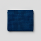 Interwoven Indigo quilting cotton showing fabric texture and geometric pattern detail