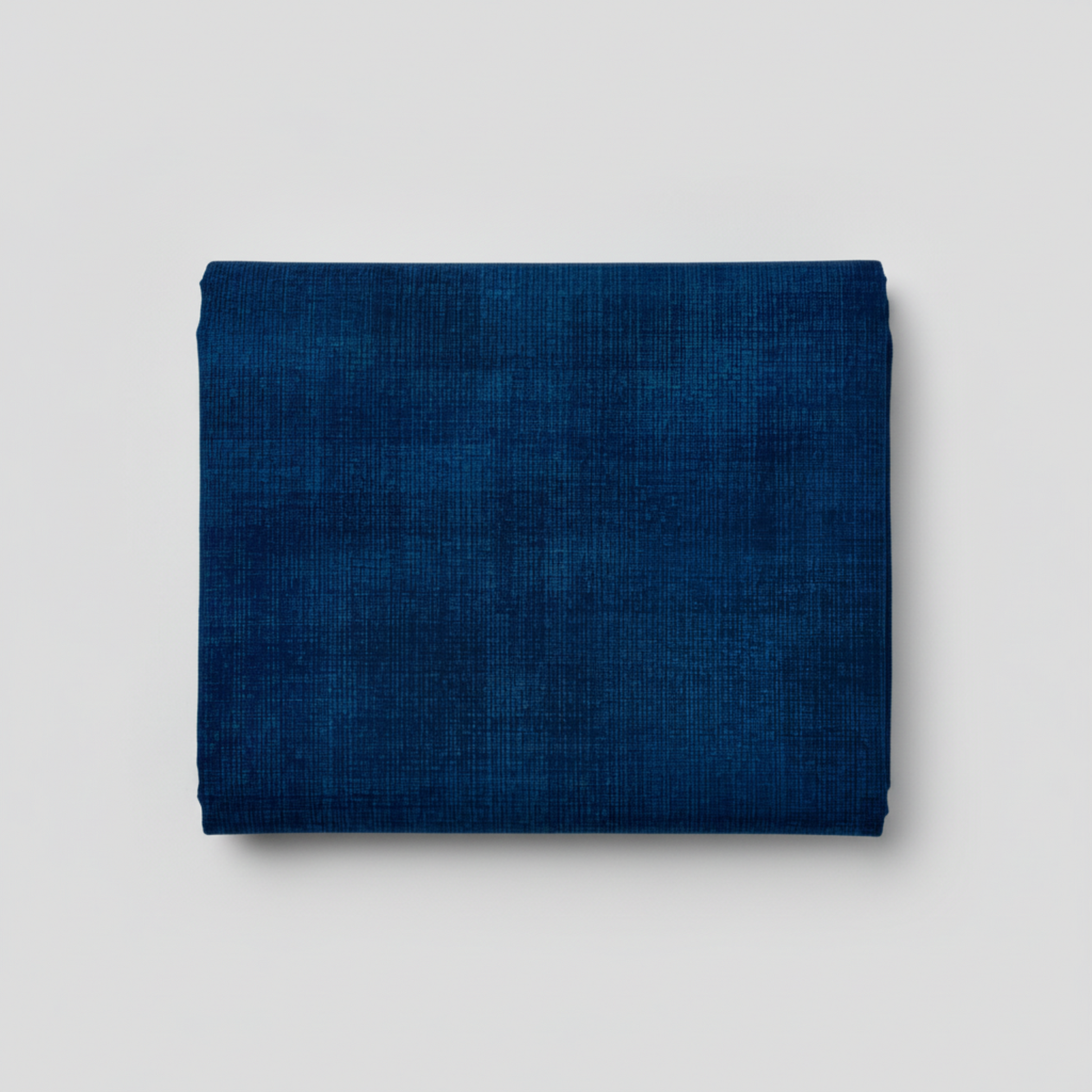 Interwoven Indigo quilting cotton showing fabric texture and geometric pattern detail