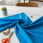Interwoven Ocean quilting cotton detail showing intersecting lines and rich ocean blue tones in geometric woven pattern