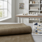 Interwoven Olive quilting cotton fabric by Jason Yenter showing soft olive green geometric woven pattern