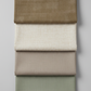 Interwoven Olive quilting cotton with three coordinating Interwoven collection fabrics – modern geometric inspiration