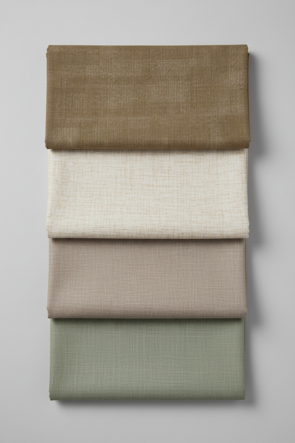 Interwoven Olive quilting cotton with three coordinating Interwoven collection fabrics – modern geometric inspiration