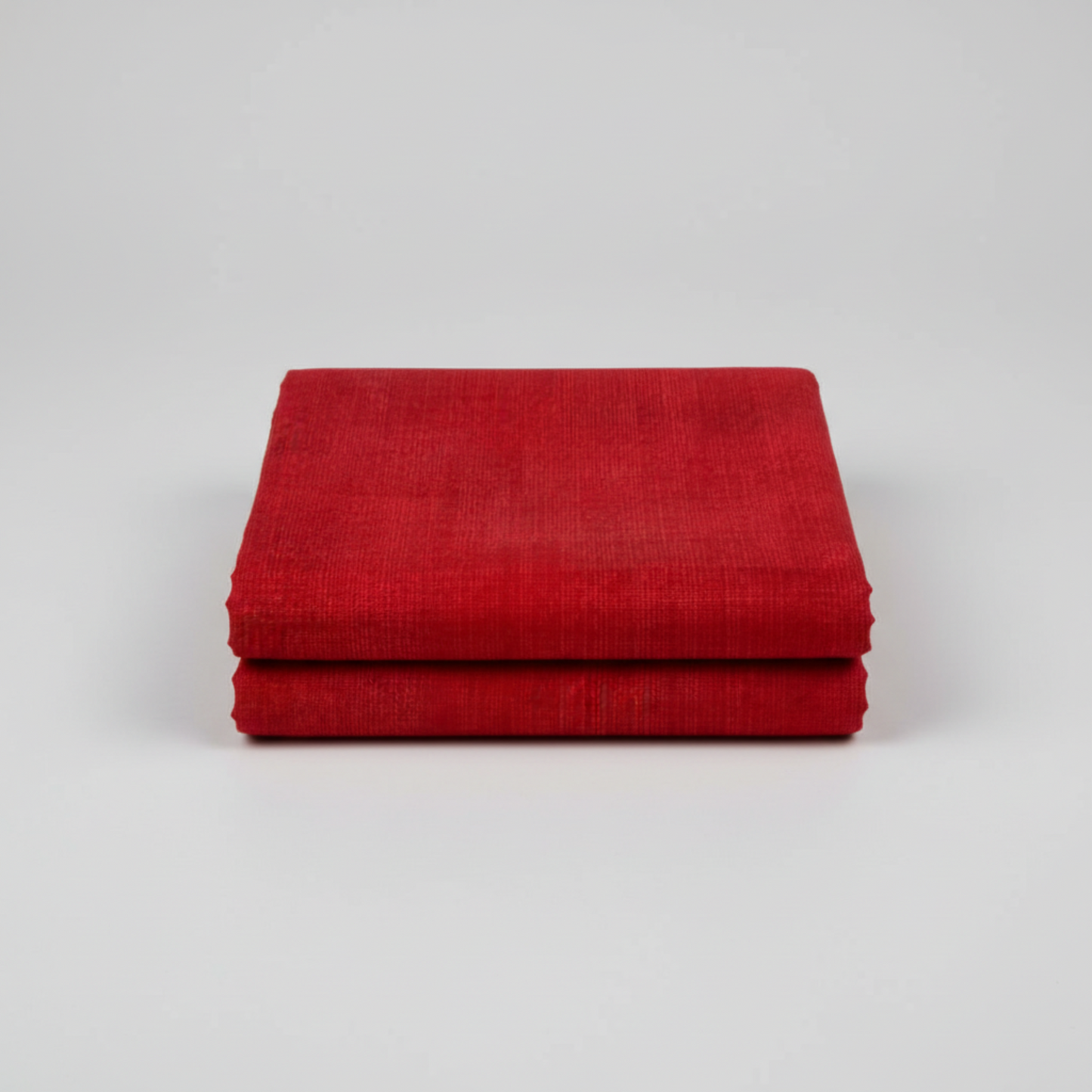 Interwoven Red quilting cotton showing fabric body and drape quality