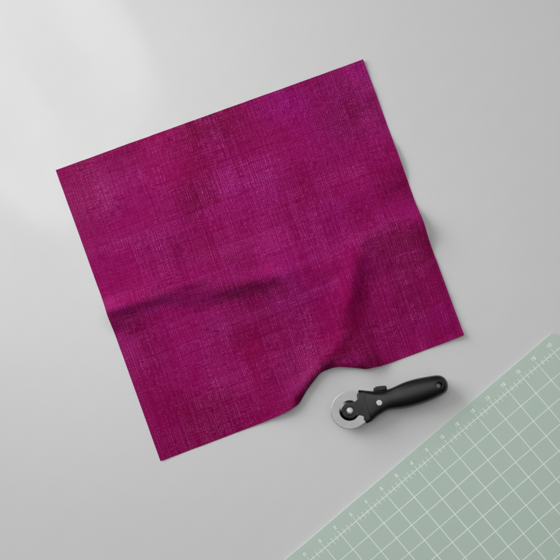 Interwoven Magenta quilting cotton detail showing intersecting lines and vibrant magenta tones in geometric woven pattern