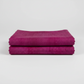 Interwoven Magenta quilting cotton showing fabric body and drape quality
