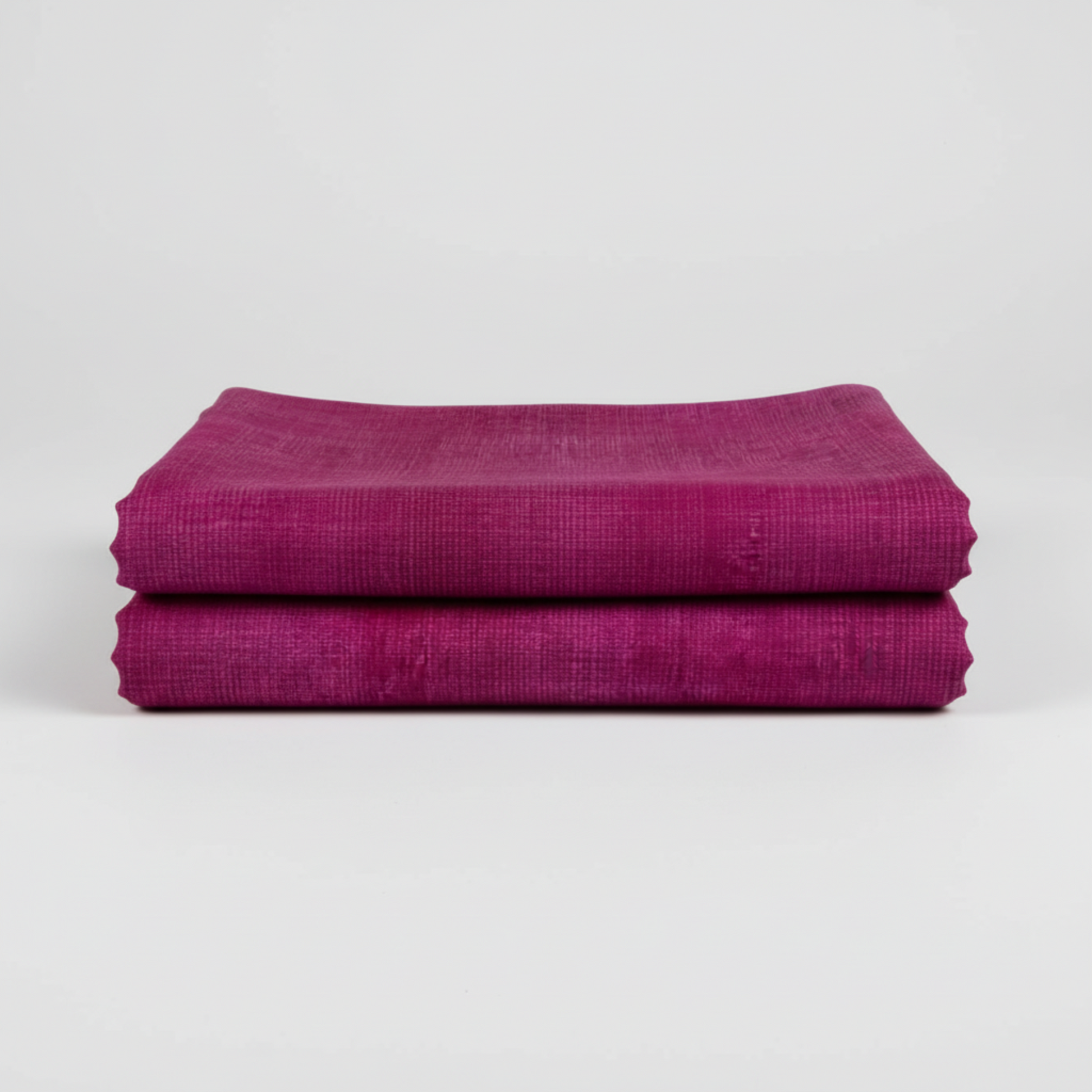 Interwoven Magenta quilting cotton showing fabric body and drape quality