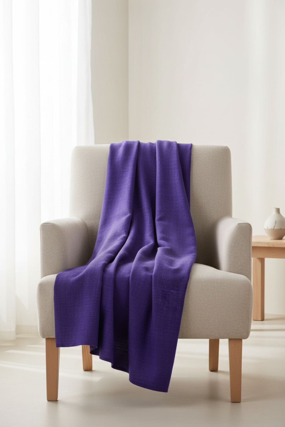 Interwoven Blueberry fabric draped over a chair – lifestyle styling, Jason Yenter for In The Beginning