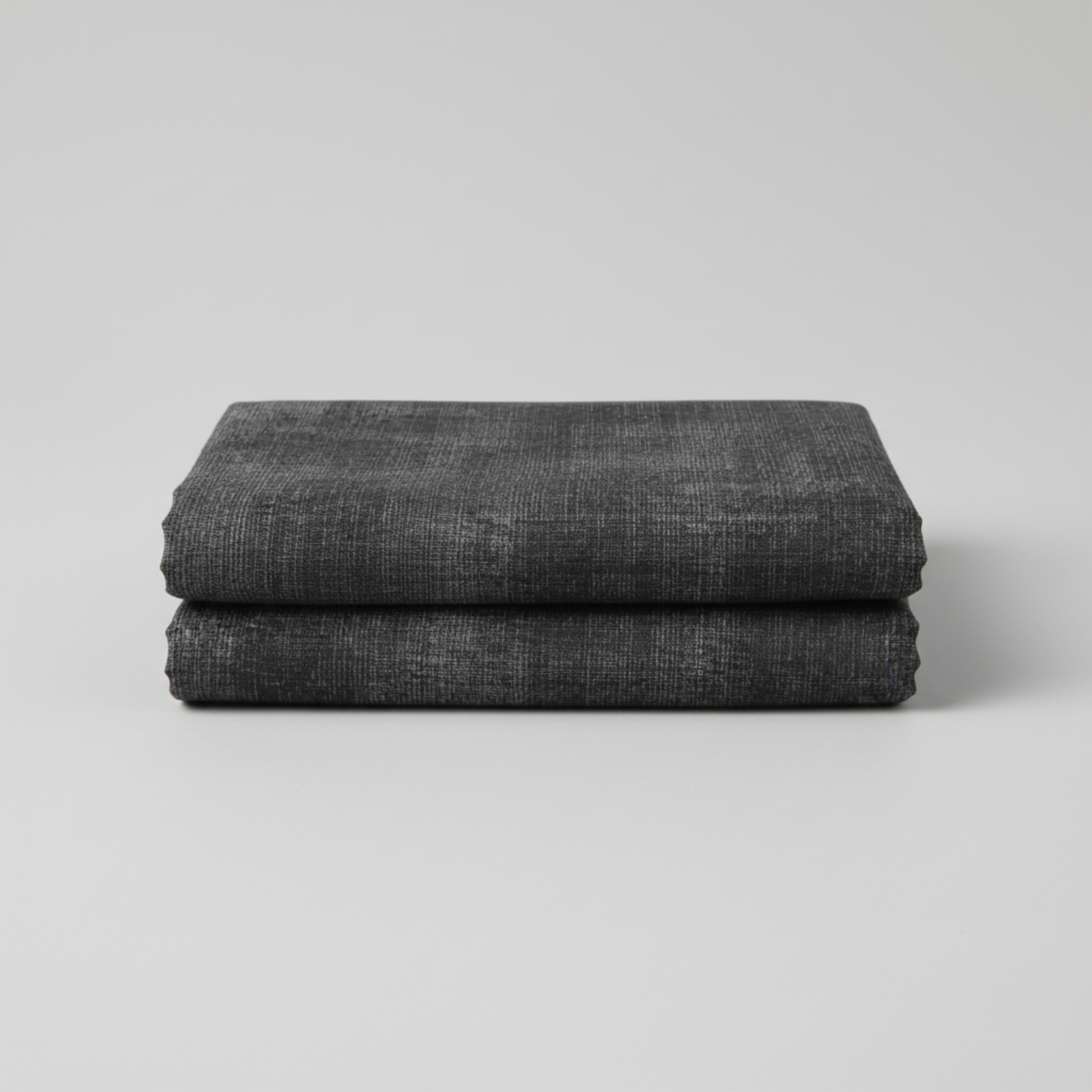 Interwoven Dark Slate by Jason Yenter – hero shot, fabric filling frame on light grey background, no props