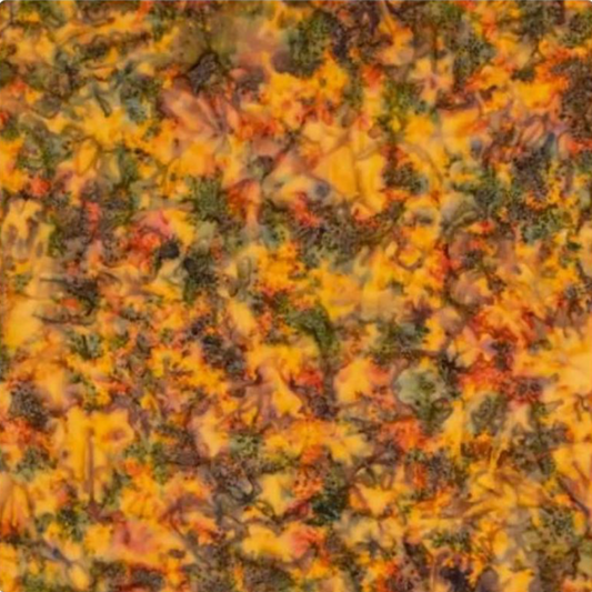 Close-up detail of Expressions Batiks Hand-Dyes Orange Multi I quilting cotton fabric by Riley Blake Designs – complex multicolor hand-dyed batik texture with golden amber-orange base, heavy olive green, slate blue-grey, muted purple, and red-orange accents