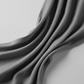Interwoven Slate by Jason Yenter – soft cascading drape showing fabric body and hand on light grey background