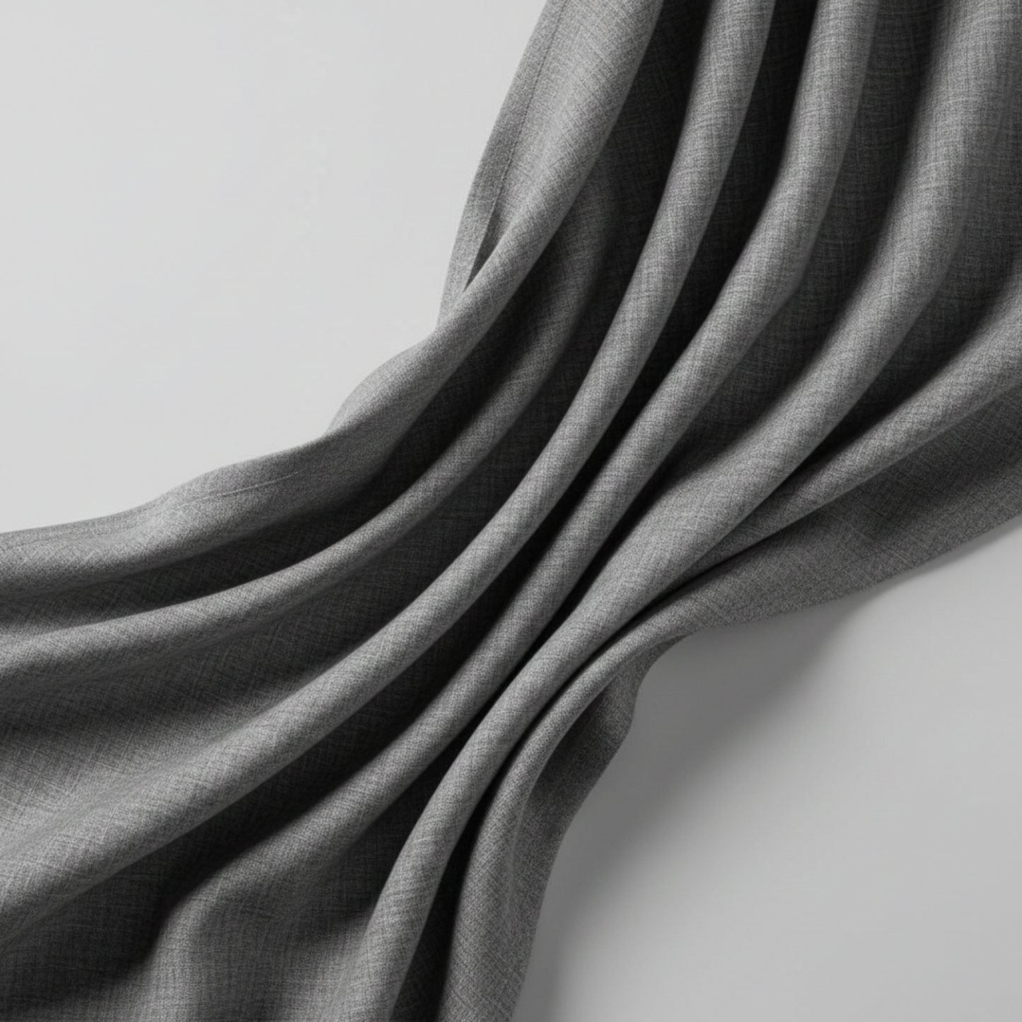 Interwoven Slate by Jason Yenter – soft cascading drape showing fabric body and hand on light grey background