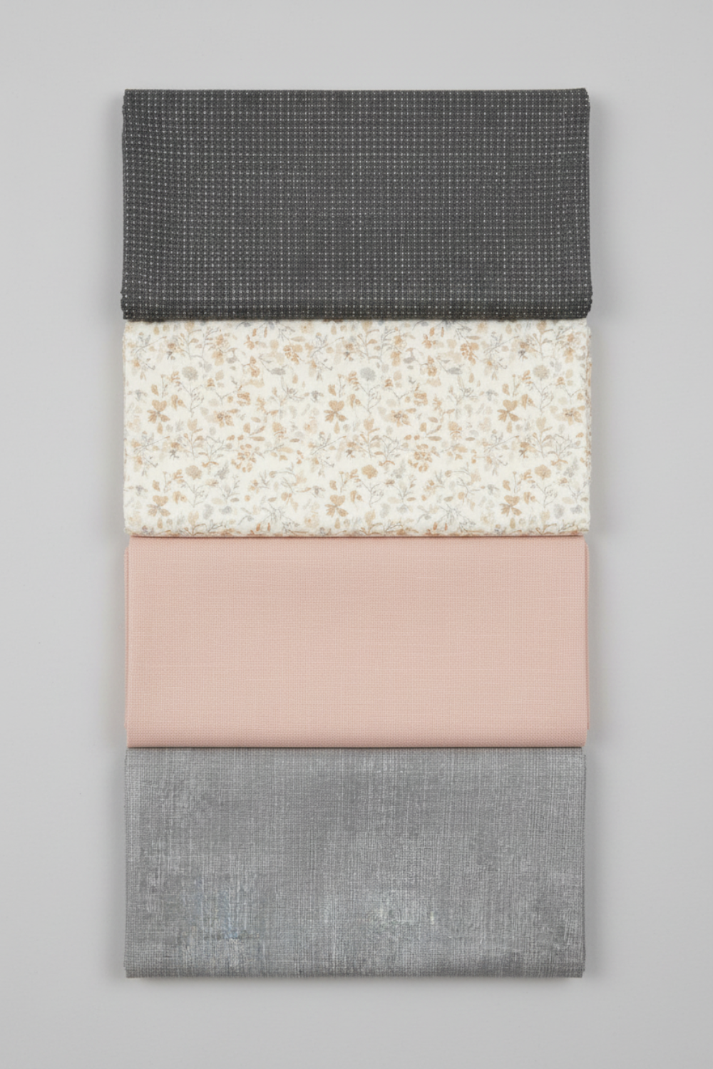 Interwoven Pewter by Jason Yenter – Pinterest fabric coordination stack of 4 complementary fabrics including Interwoven Pewter, stacked vertically on light grey background