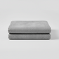 Interwoven Pewter by Jason Yenter – hero shot, fabric on flat surface with soft folds, light grey background