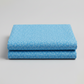 Safari Fun Floating Triangles Blue quilting fabric by Terry Runyan for Benartex – two neatly folded fabric pieces stacked, showing triangle print and fabric weight, light grey background