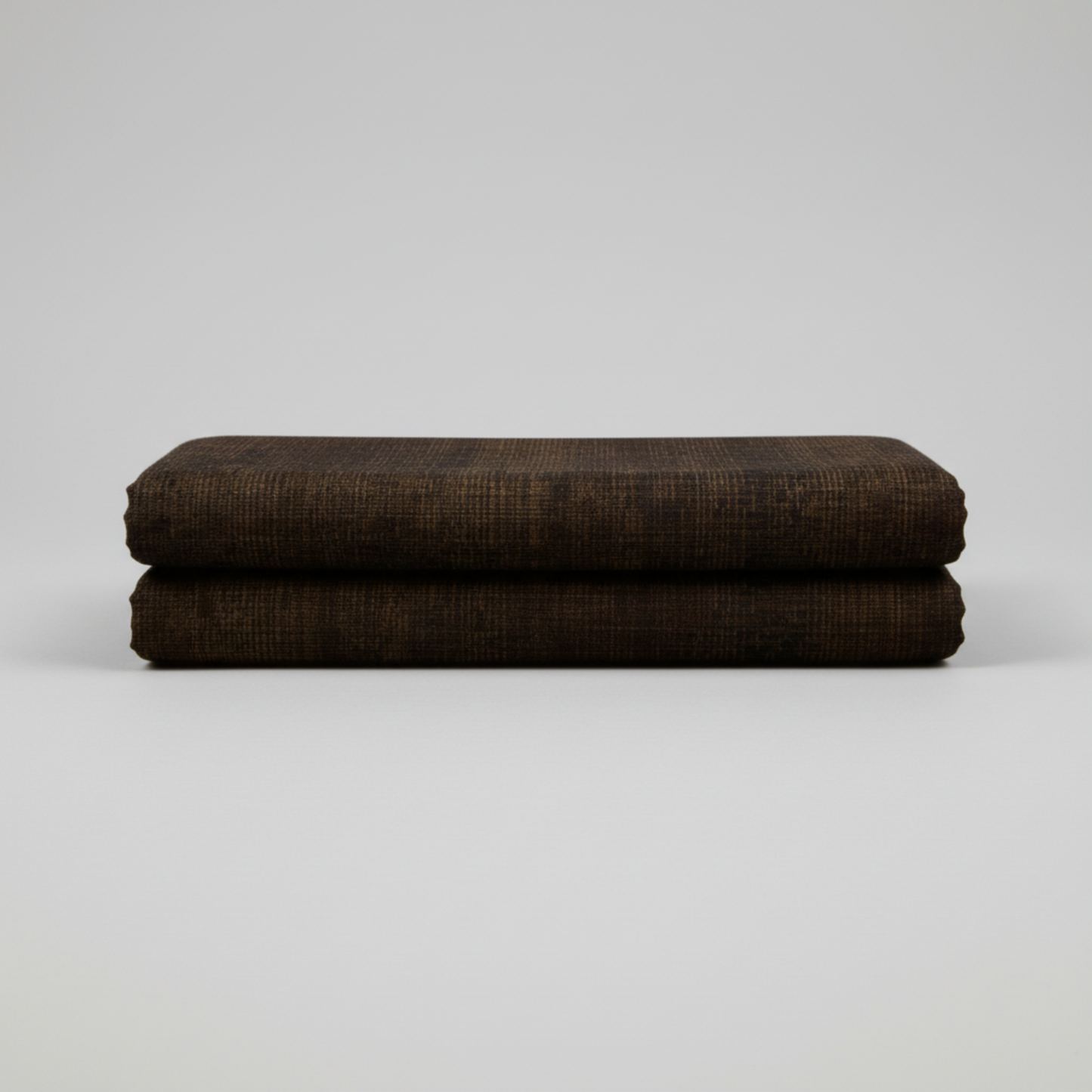 Interwoven Espresso by Jason Yenter – hero shot, fabric on flat surface with soft folds, light grey background