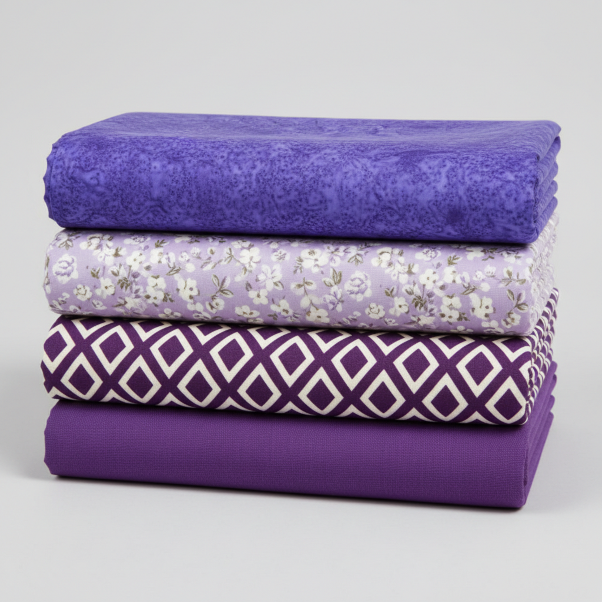 Expressions Batiks Hand-Dyed Purple II – coordination stack with 4 complementary fabrics arranged vertically on light grey background