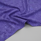 Expressions Batiks Hand-Dyed Purple II – fabric laying flat on surface showing full drape and rich purple hand-dyed batik pattern