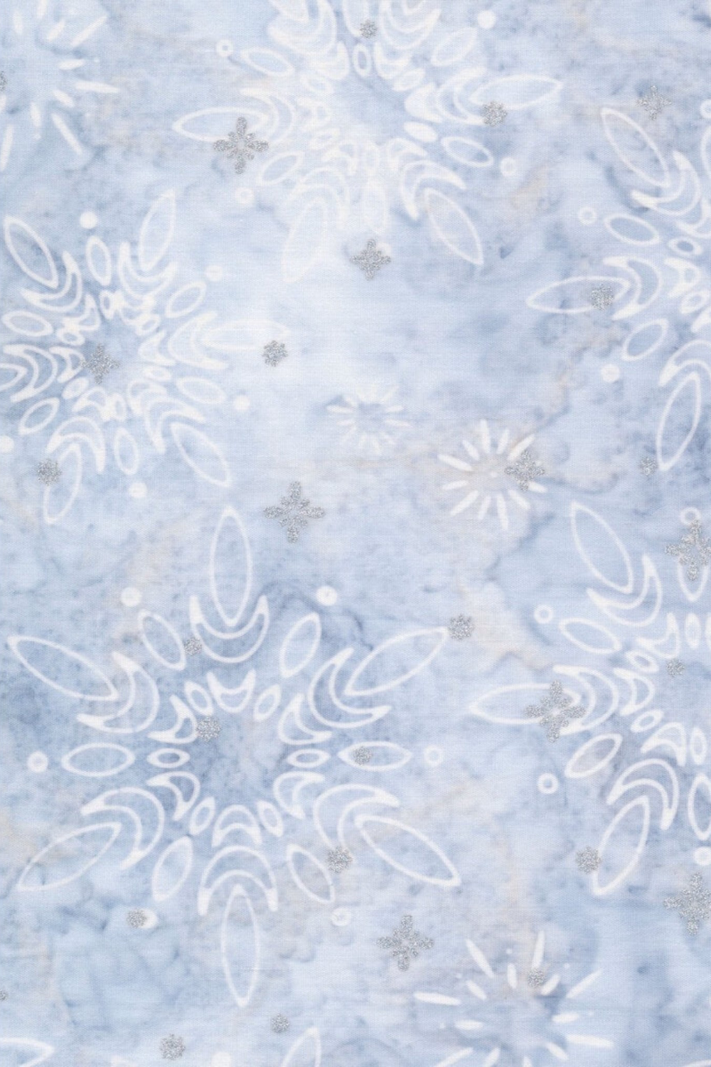 Winter Sparkle Glacier Artisan Batiks quilting cotton by Robert Kaufman Fabrics – soft powder blue tone-on-tone hand-dyed batik with white snowflake and daisy medallion motifs and delicate silver metallic glitter accents, 100% cotton, 43–44" wide