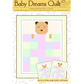 Baby Dreams Quilt pattern by Wendy Sheppard – front cover showing sleepy bear cub tucked under a pastel patchwork quilt, 39.5 x 49.5 inches