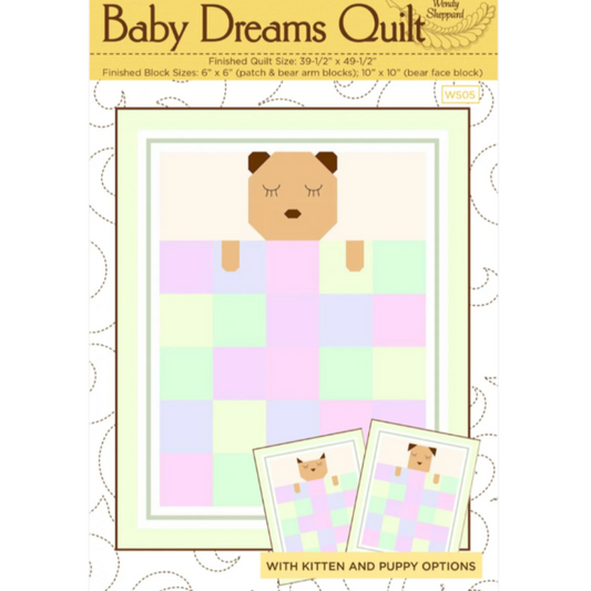 Baby Dreams Quilt pattern by Wendy Sheppard – front cover showing sleepy bear cub tucked under a pastel patchwork quilt, 39.5 x 49.5 inches
