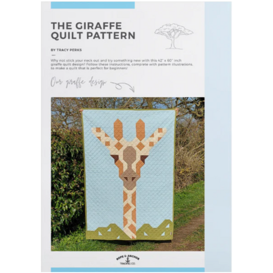The Giraffe Quilt Pattern by Tracy Perks – patchwork giraffe portrait quilt in sky blue, green, and earthy browns, beginner friendly 42 x 60 inches