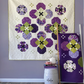 Bold pansy blooms set on point in purple & green! Pansy Face by Robin Pickens — lap or queen size, Layer Cake & Charm Pack friendly. Shop at IraRobi Quilts! #QuiltPattern #RobinPickens #FloralQuilt