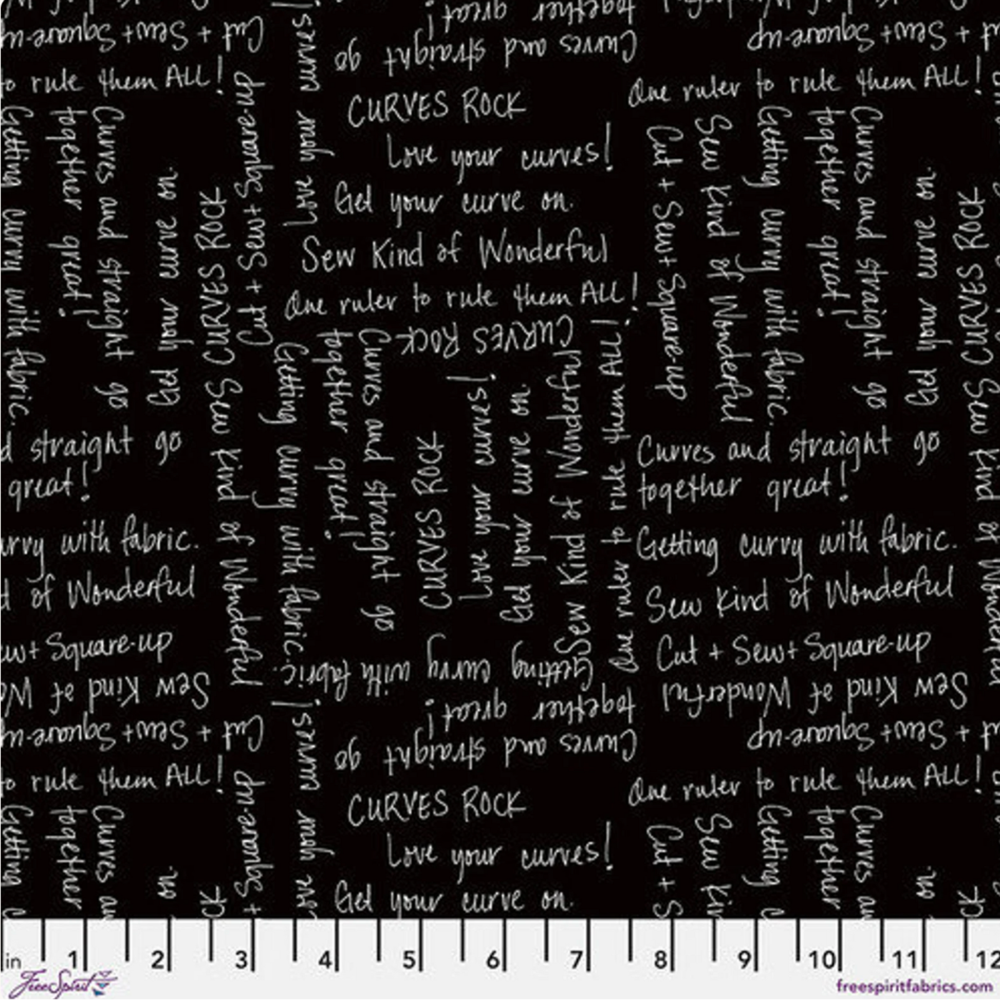 Writing on the Wall Curves Black quilting cotton by Sew Kind of Wonderful for FreeSpirit Fabrics -- close-up with ruler showing scale, rich black ground with white handwritten quilting phrases including Curves Rock, Love your curves, Get your curve on, Sew Kind of Wonderful, and Cut and Sew and Square-up -- 100% cotton, 43-44" wide