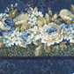 Carpet Bag Romance Blue Border Print quilting cotton fabric showing lush cascading floral garland stripe – ivory and blue roses, white hydrangeas, and olive foliage on deep navy damask ground with coordinating olive leaf border by Jason Yenter for In The Beginning Fabrics, 100% cotton, 3 yard cut