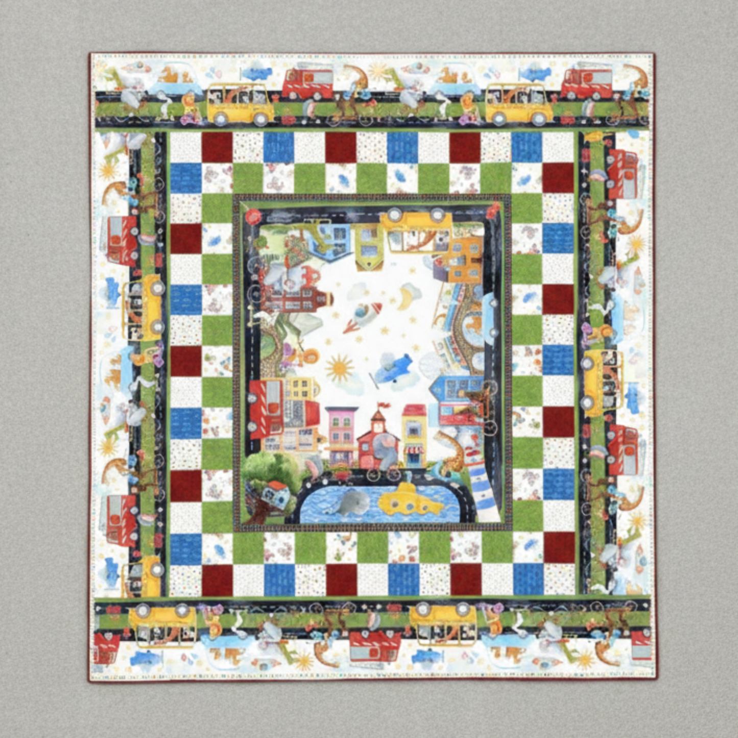 Full view of On the Go quilt with city-scene center panel, checkerboard border, and playful road-themed outer border.