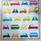 Handmade Cool Cars quilt with colorful car designs laid flat outdoors