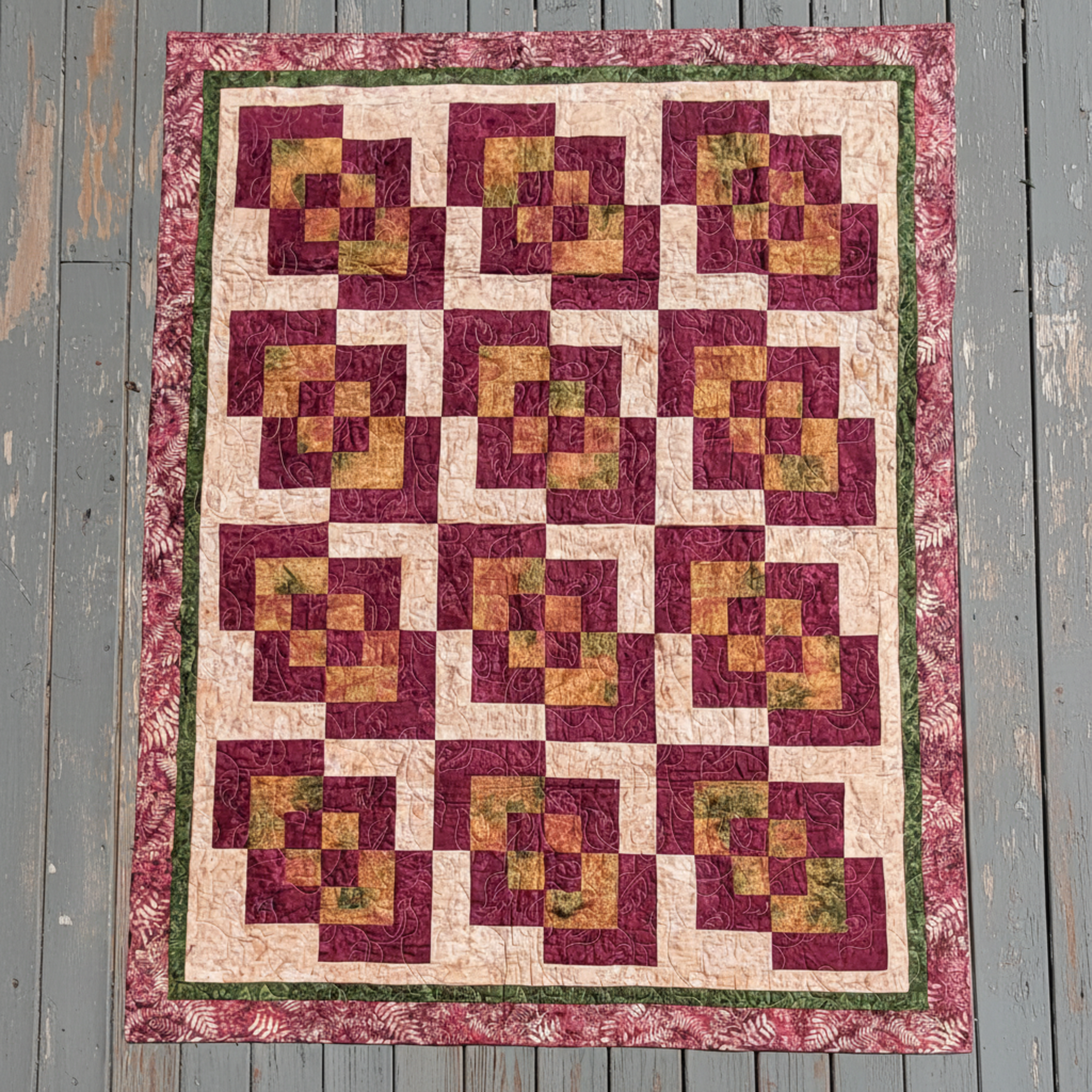 Corner Play handmade quilt with bold geometric blocks laid flat outdoors