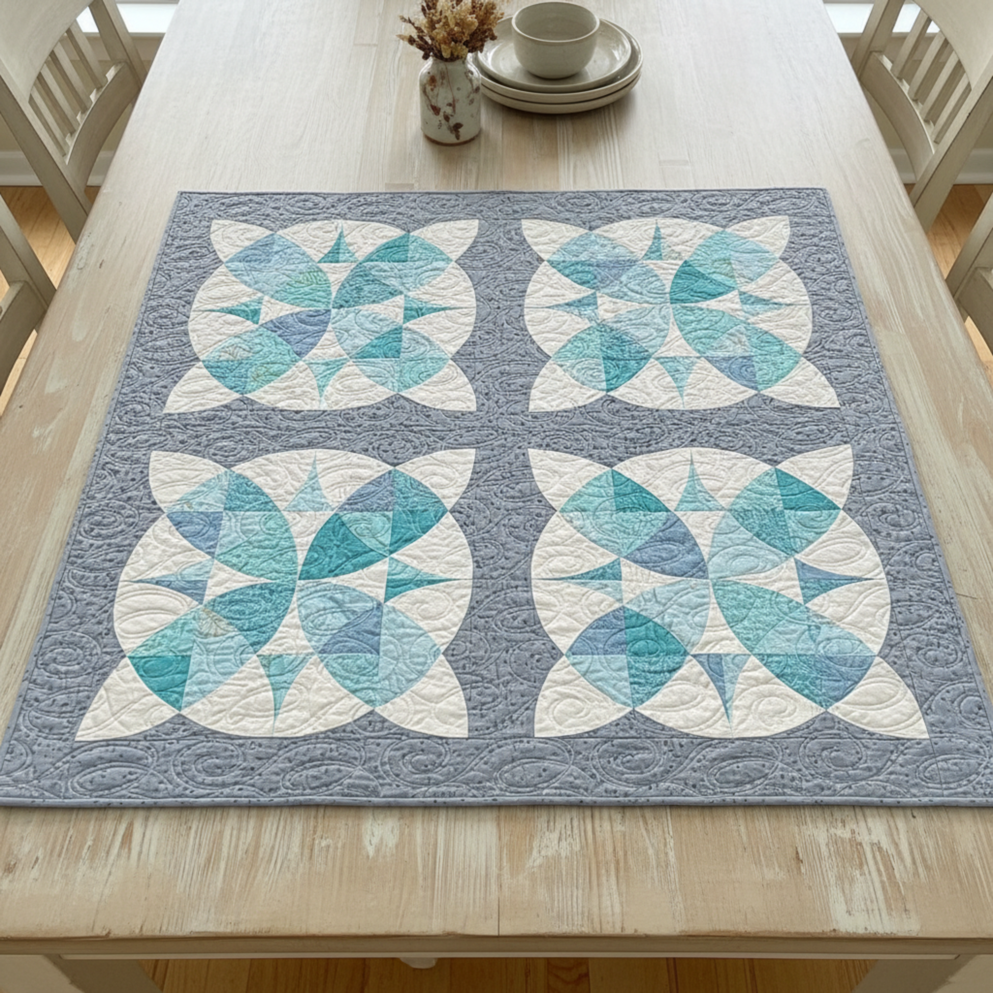 Quilt with butterfly pattern on a wooden table