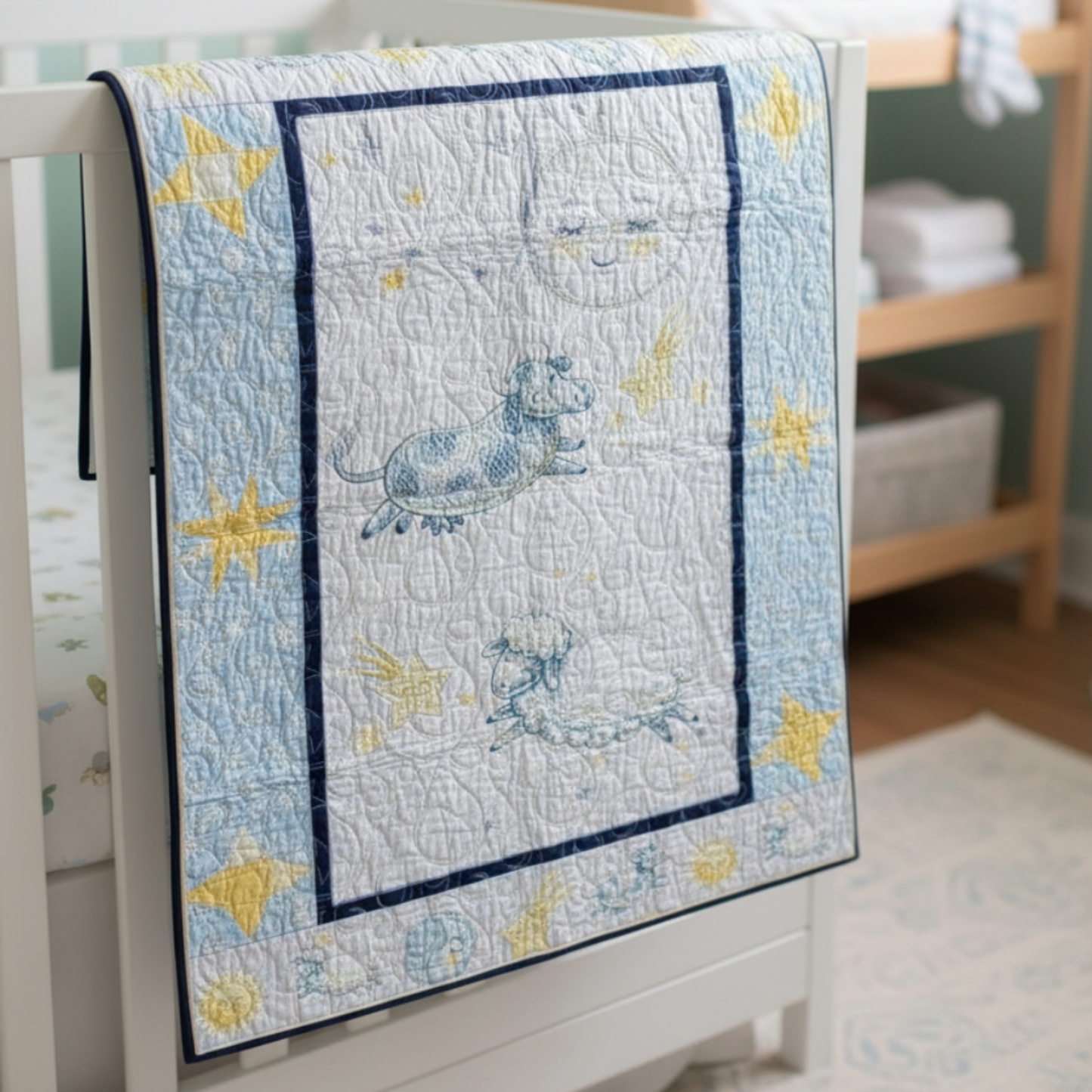 Baby crib with a blue quilt featuring animal designs in a nursery setting