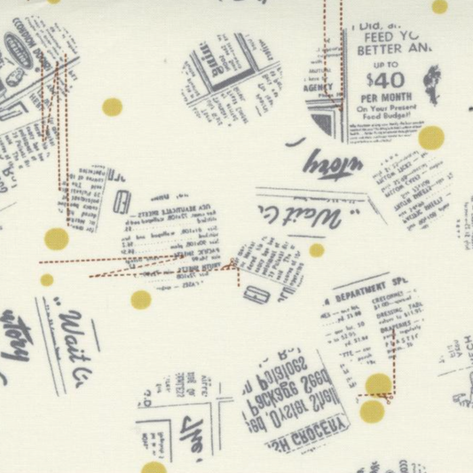 Celestial News Dropping Moonbeam fabric by Zen Chic for Moda Fabrics, with charcoal newsprint motifs and mustard-gold dots on ivory.