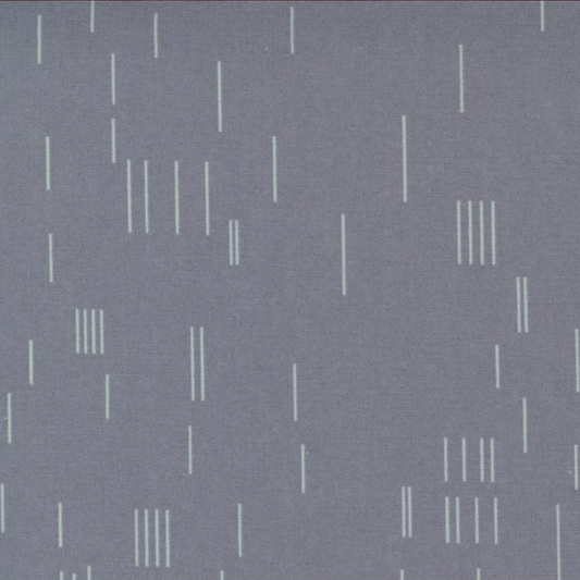 Close-up of Celestial Strokes Aluminum fabric by Zen Chic for Moda Fabrics, with fine white vertical marks on aluminum gray.