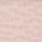 Close-up of Celestial Washi Rose Quartz fabric by Zen Chic for Moda Fabrics, featuring scattered dotted geometric marks on a blush-pink background.