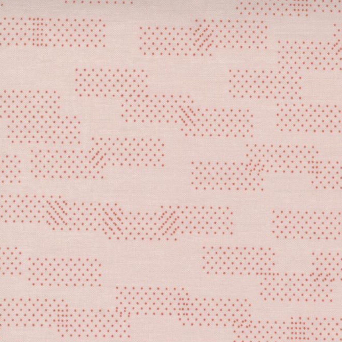 Close-up of Celestial Washi Rose Quartz fabric by Zen Chic for Moda Fabrics, featuring scattered dotted geometric marks on a blush-pink background.