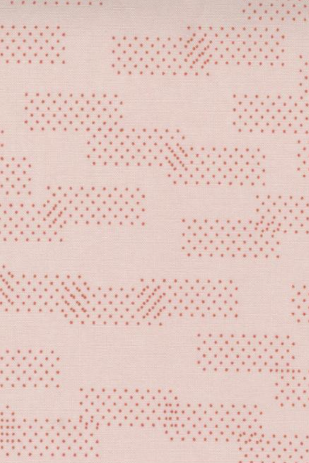 Close-up of Celestial Washi Rose Quartz fabric by Zen Chic for Moda Fabrics, with scattered dotted geometric marks on a blush-pink background