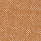 Close-up of Lazy Afternoon Bronze fabric by Zen Chic for Moda Fabrics, showing small, irregular pale dots across a warm bronze ground.