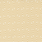 Lazy Afternoon Golden fabric by Zen Chic for Moda Fabrics, showing a golden geometric maze and spiral print on a cream ground, beside a ruler for scale.