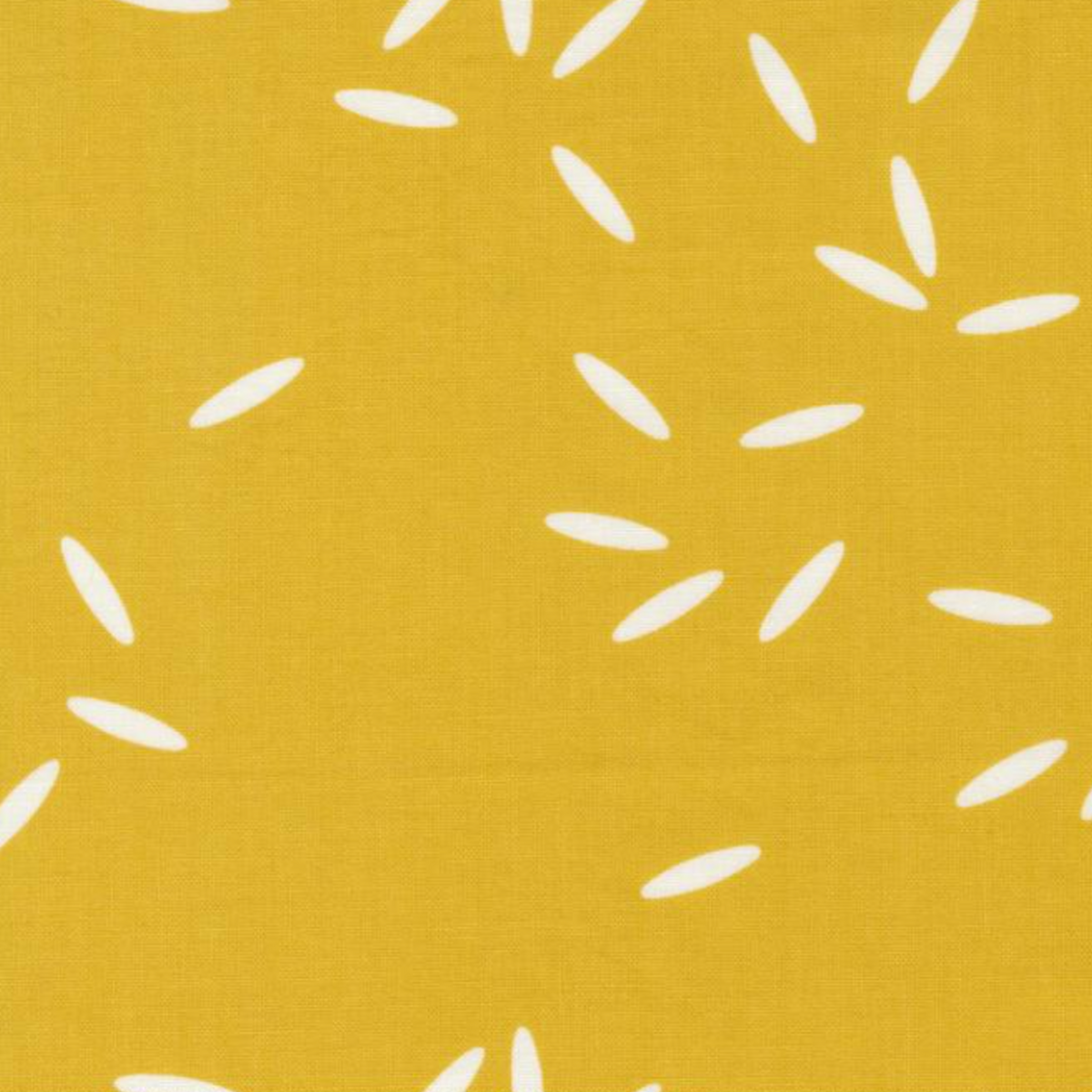 Close-up of Filigree Rice Saffron fabric by Zen Chic for Moda Fabrics showing white rice-grain shapes on a saffron-mustard ground