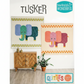 Two colorful elephant wall art pieces on a white wall with 'Tusker' and 'Sew Kind of Wonderful' branding.