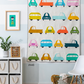 Colorful car pattern quilt hanging on a wall with 'Sew Kind of Wonderful' branding.