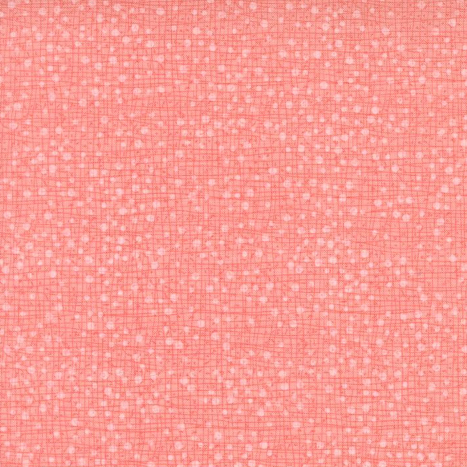 Dotty Thatched Carnation quilting cotton by Robin Pickens for Moda Fabrics — close-up showing the warm coral-pink ground with scattered tonal dots and crosshatch texture detail. 100% cotton. Available at IraRobi Quilts.