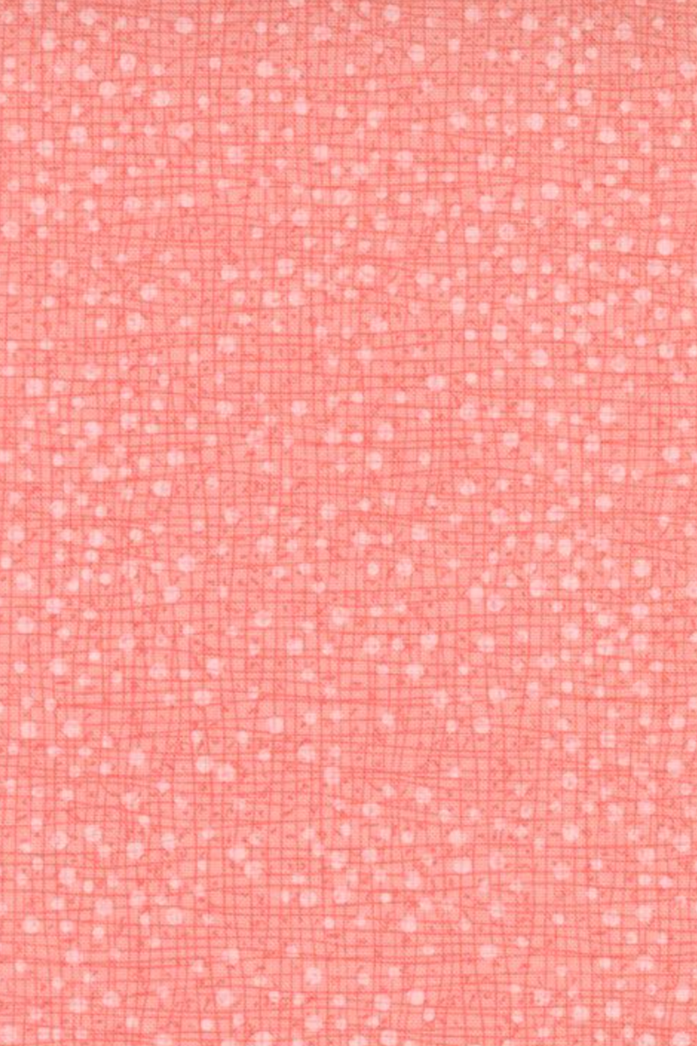 Dotty Thatched Carnation quilting cotton by Robin Pickens for Moda Fabrics — vertical close-up showing the warm coral-pink ground with scattered tonal dots and crosshatch texture detail. 100% cotton. Available at IraRobi Quilts.