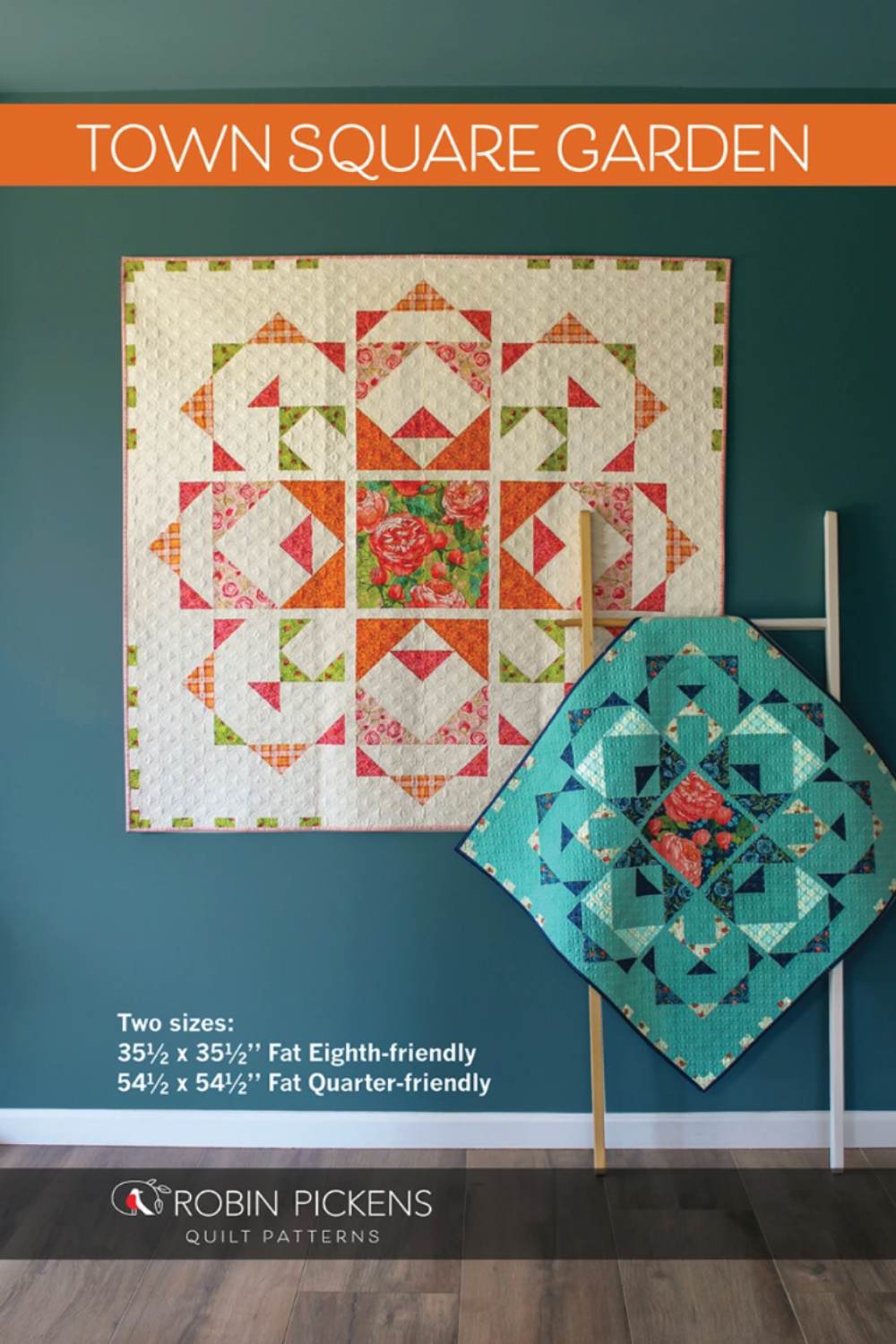 Town Square Garden quilt pattern by Robin Pickens showing large and small quilt designs displayed on a teal wall